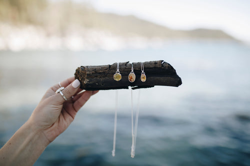 Sterling silver necklaces with genuine stones.