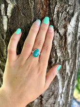 Load image into Gallery viewer, Photo of the white water turquoise ring on my finger. 
