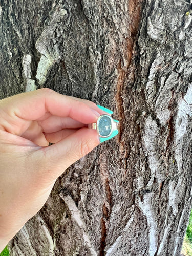 Blue Kyanite stone set on a sterling silver band. This ring is a size 7. 