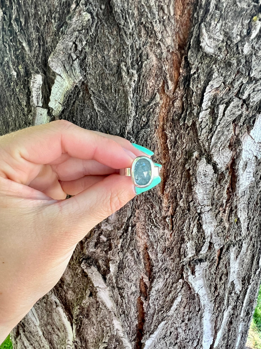 Blue Kyanite stone set on a sterling silver band. This ring is a size 7. 